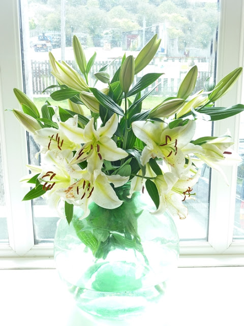 a bowl of lilies